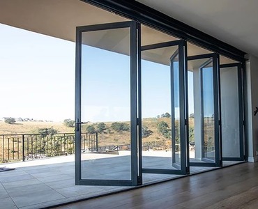 Aluminum Bifold Door from www.otrix.ae